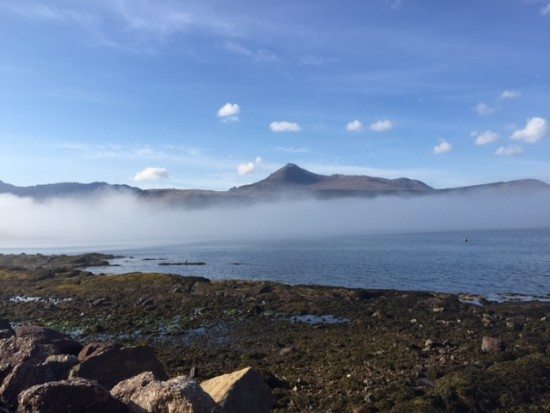 Goatfell behind the clouds seen from Brodick, Arran.